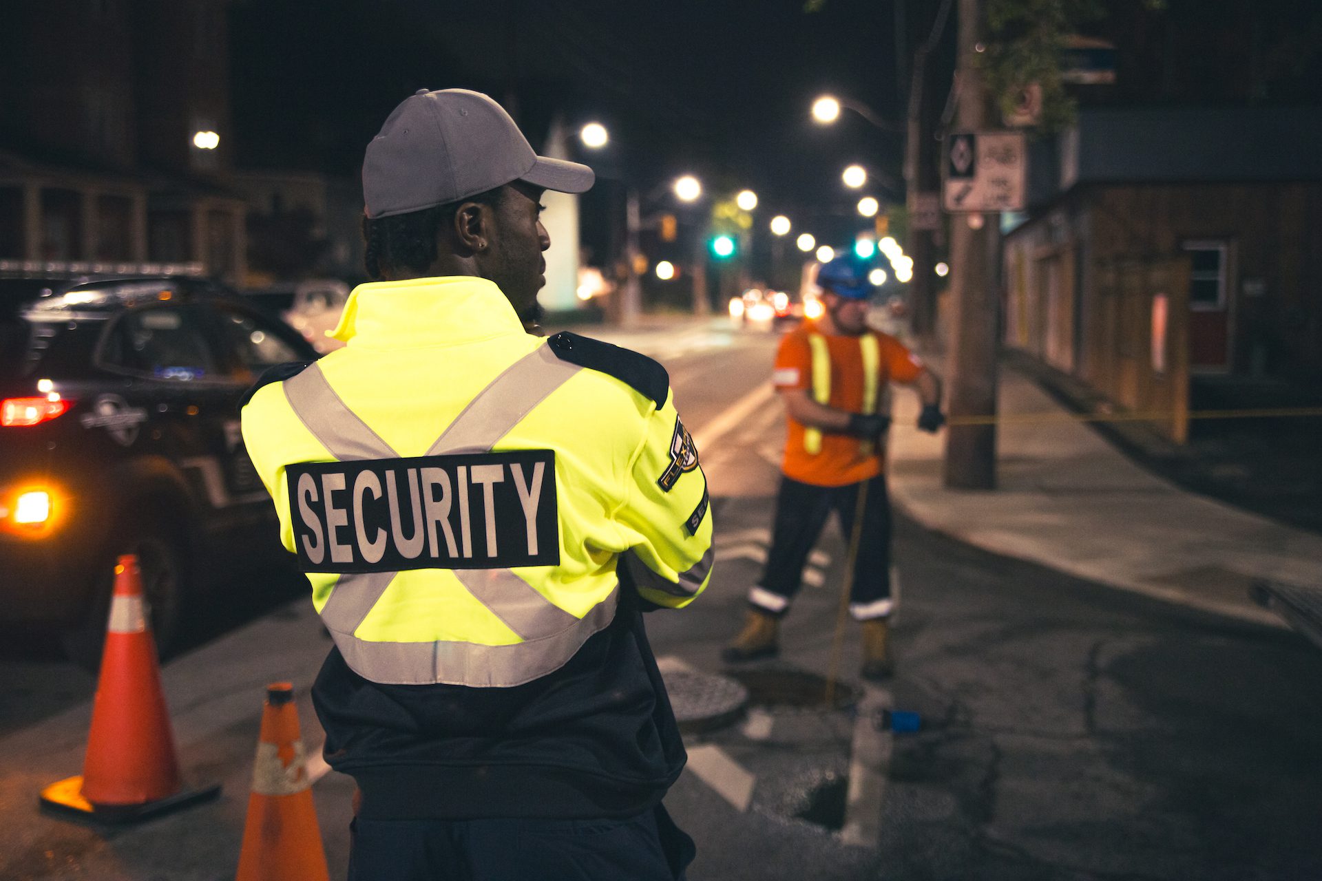 Professional security guard monitoring construction site